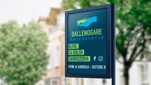 Elemento Portfolio. Cartellone pubblicitario per carrozzeria Dallenogare Trento. Logo e payoff